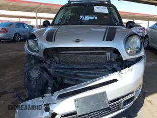 2014 MINI Countryman S with VIN WMWZC3C56EWP27328, listed as a IAAI auction lot 42187458 with 140,616 mi miles and . Bid and sale history available at DreamBid. Image 13.