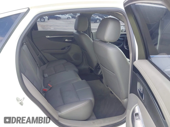 2018 Chevrolet Impala LT z VIN 2G1105S30J9149873, wystawiony jako IAAI lot #42018654 z przebiegiem 118 132 mil mil oraz . Historia ofert i sprzedaży dostępna na DreamBid. Obrazek 8.