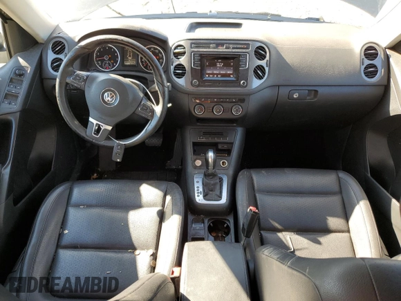 2016 Volkswagen Tiguan S with VIN WVGBV7AX0GW524346, listed as a Copart auction lot 87221564 with 163,609 mi miles and Salvage Title. Bid and sale history available at DreamBid. Image 8.