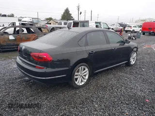 2019 Volkswagen Passat 2.0T Wolfsburg Edition with VIN 1VWLA7A39KC011539, listed as a IAAI auction lot 41616136 with 54,652 mi miles. Bid and sale history available at carsss.com. Image 4.