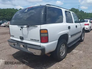 2005 Chevrolet Tahoe LS with VIN 1GNEC13V65R154250, listed as a IAAI auction lot 42633273 with 319,329 mi miles and . Bid and sale history available at DreamBid. Image 4.