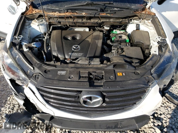 2016 Mazda CX-5 Touring with VIN JM3KE2CY6G0896040, listed as a Copart auction lot 78399684 with 98,639 mi miles and Salvage Title. Bid and sale history available at DreamBid. Image 13.