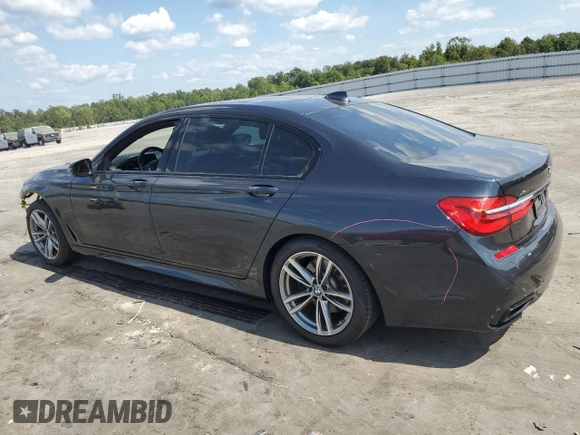 2017 BMW 7 Series with VIN WBA7F2C31HG423118, listed as a Copart auction lot 70628914 with 85,512 mi miles and Salvage Title. Bid and sale history available at DreamBid. Image 2.