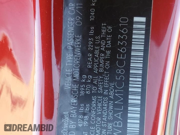 2012 BMW Z4 sDrive35is with VIN WBALM1C58CE633610, listed as a Copart auction lot 42824955 with 84,901 mi miles and Salvage title. Bid and sale history available at DreamBid. Image 12.