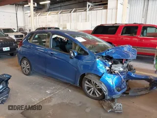 2015 Honda Fit EX-L z VIN 3HGGK5H8XFM762257, wystawiony jako IAAI lot #42398067 z przebiegiem Nie podano mil oraz . Historia ofert i sprzedaży dostępna na DreamBid. Obrazek 1.