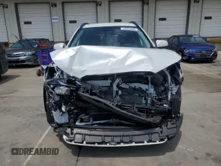 2023 Toyota Corolla Cross LE with VIN 7MUCAAAG2PV053730, listed as a Copart auction lot 54825035 with 33,313 mi miles and Salvage title. Bid and sale history available at DreamBid. Image 5.