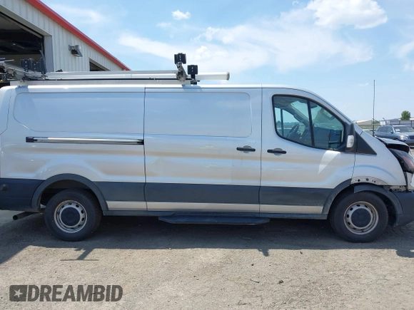2020 Ford Transit Cargo z VIN 1FTYE1Y80LKB53684, wystawiony jako IAAI lot #42556377 z przebiegiem 102 801 mil mil oraz . Historia ofert i sprzedaży dostępna na DreamBid. Obrazek 14.