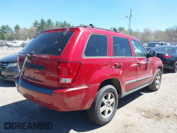 2009 Jeep Grand Cherokee Laredo with VIN 1J8GR48K79C543304, listed as a IAAI auction lot 42151011 with 157,679 mi miles. Bid and sale history available at carsss.com. Image 4.