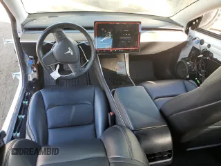 2019 Tesla Model 3 Mid Range with VIN 5YJ3E1EA4KF401500, listed as a Copart auction lot 80029064 with 100,077 mi miles and Salvage Title. Bid and sale history available at carsss.com. Image 8.