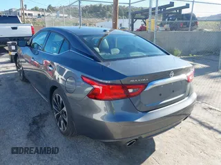 2018 Nissan Maxima Platinum z VIN 1N4AA6AP7JC392710, wystawiony jako IAAI lot #41866951 z przebiegiem 49 026 mil mil oraz . Historia ofert i sprzedaży dostępna na DreamBid. Obrazek 3.