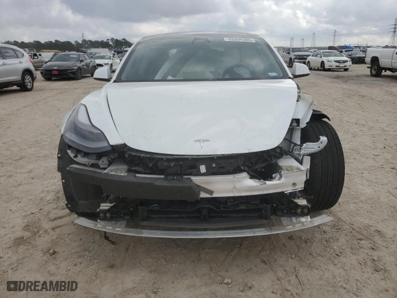 2021 Tesla Model 3 Standard Range Plus with VIN 5YJ3E1EA2MF030744, listed as a Copart auction lot 43335385 with 17,897 mi miles and Salvage Title. Bid and sale history available at carsss.com. Image 5.