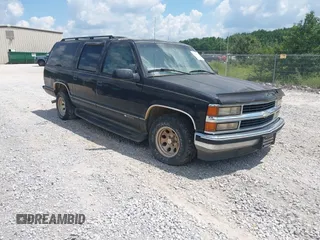 1996 Chevrolet Suburban with VIN 3GNEC16R3TG120004, listed as a IAAI auction lot 42752410 with 291,491 mi miles and . Bid and sale history available at DreamBid. Image 1.