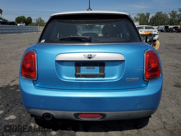 2015 MINI Hardtop 4 Door z VIN WMWXS5C5XFT827473, wystawiony jako Copart lot #58261135 z przebiegiem 75 439 mil mil oraz Szkoda całkowita • Salvage title. Historia ofert i sprzedaży dostępna na DreamBid. Obrazek 6.