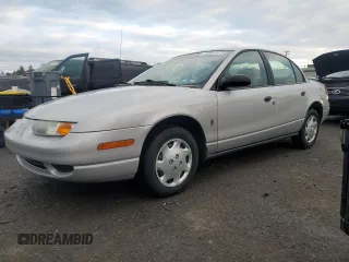 2001 Saturn SL z VIN 1G8ZH52871Z295511, wystawiony jako Copart lot #43020175 z przebiegiem 87 008 mil mil oraz Szkoda całkowita • Salvage title. Historia ofert i sprzedaży dostępna na DreamBid. Obrazek 1.