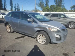 2012 Mazda CX-7 i SV with VIN JM3ER2A5XC0415369, listed as a Copart auction lot 83268654 with 186,891 mi miles and Clean Title. Bid and sale history available at carsss.com. Image 4.