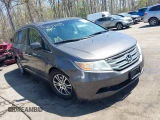 2012 Honda Odyssey EX-L with VIN 5FNRL5H68CB006686, listed as a IAAI auction lot 42039035 with 338,331 mi miles and . Bid and sale history available at carsss.com. Image 1.