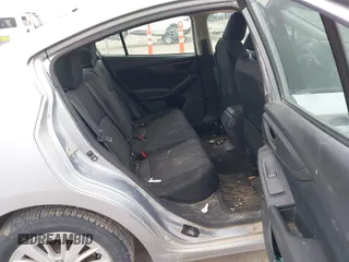 2018 Subaru Impreza Premium z VIN 4S3GKAD67J3604898, wystawiony jako IAAI lot #41694176 z przebiegiem 97 287 mil mil oraz . Historia ofert i sprzedaży dostępna na DreamBid. Obrazek 8.