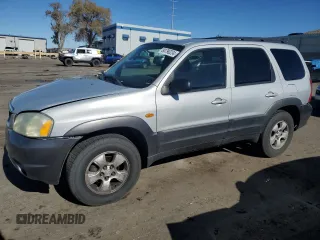 2004 Mazda Tribute ES with VIN 4F2CZ06124KM32649, listed as a Copart auction lot 80790234 with 231,973 mi miles and Salvage Title. Bid and sale history available at carsss.com. Image 1.