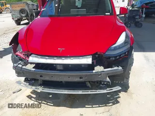 2020 Tesla Model Y Long Range with VIN 5YJYGDEE0LF029496, listed as a IAAI auction lot 41977695 with 47,958 mi miles and . Bid and sale history available at DreamBid. Image 17.