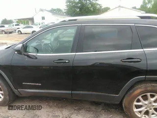 2014 Jeep Cherokee Latitude with VIN 1C4PJLCB1EW231178, listed as a IAAI auction lot 42128894 with 121,412 mi miles. Bid and sale history available at carsss.com. Image 14.