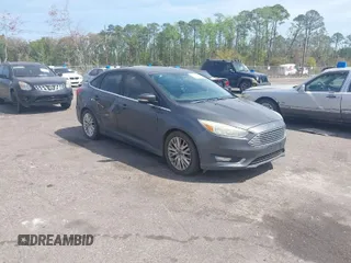2015 Ford Focus Titanium with VIN 1FADP3J24FL277732, listed as a IAAI auction lot 41903397 with 238,138 mi miles and . Bid and sale history available at carsss.com. Image 1.