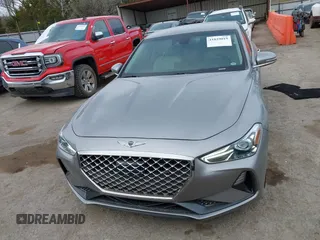 2021 Genesis G70 2.0T with VIN KMTG64LA9MU073635, listed as a IAAI auction lot 41829019 with 47,186 mi miles and . Bid and sale history available at DreamBid. Image 12.