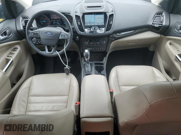 2018 Ford Escape Titanium with VIN 1FMCU9J93JUC01903, listed as a Copart auction lot 57337045 with 59,276 mi miles and Salvage title. Bid and sale history available at DreamBid. Image 8.
