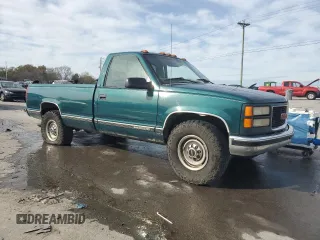 1997 GMC Sierra 1500 with VIN 1GTGC24JXVE524979, listed as a Copart auction lot 79087634 with 170,567 mi miles and Salvage Title. Bid and sale history available at DreamBid. Image 4.