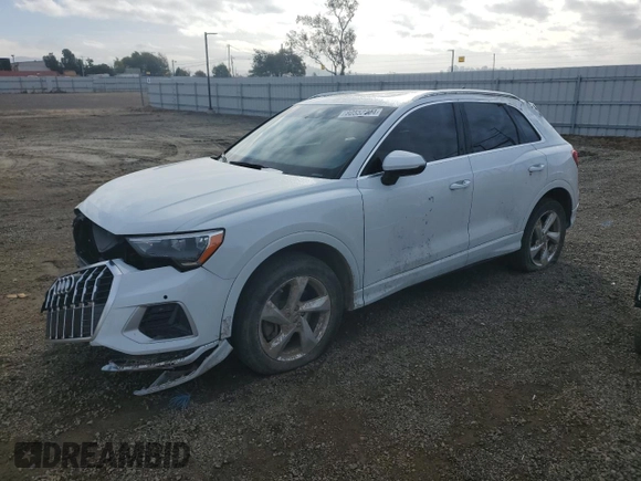 2019 Audi Q3 Premium with VIN WA1AECF30K1085132, listed as a Copart auction lot 80552304 with 121,758 mi miles and Salvage Title. Bid and sale history available at carsss.com. Image 1.