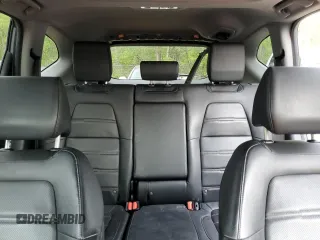 2020 Honda CR-V Touring z VIN 2HKRW2H9XLH236764, wystawiony jako Copart lot #59693475 z przebiegiem Nie podano mil oraz Czysty tytuł • Clean title. Historia ofert i sprzedaży dostępna na DreamBid. Obrazek 10.