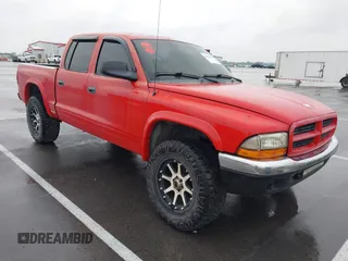 2001 Dodge Dakota Sport z VIN 1B7GG2AN91S110843, wystawiony jako IAAI lot #42316636 z przebiegiem 263 073 mil mil oraz . Historia ofert i sprzedaży dostępna na DreamBid. Obrazek 1.