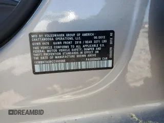 2012 Volkswagen Passat SE z VIN 1VWBH7A39CC092065, wystawiony jako Copart lot #52719595 z przebiegiem 161 991 mil mil oraz Szkoda całkowita • Salvage title. Historia ofert i sprzedaży dostępna na DreamBid. Obrazek 12.