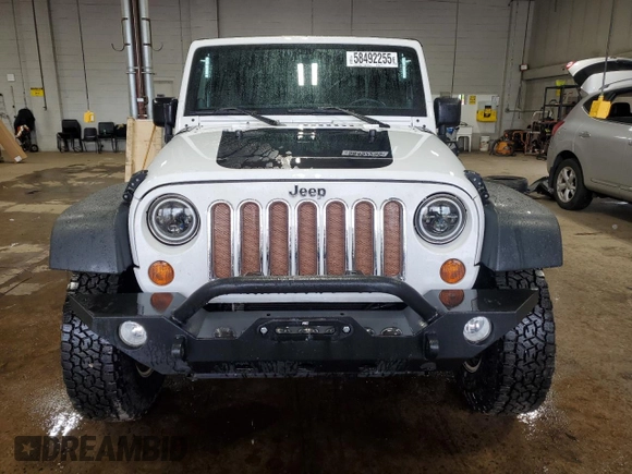 2013 Jeep Wrangler Rubicon 10th Anniversary z VIN 1C4BJWCGXDL543958, wystawiony jako Copart lot #58492255 z przebiegiem 94 455 mil mil oraz Szkoda całkowita • Salvage title. Historia ofert i sprzedaży dostępna na DreamBid. Obrazek 5.