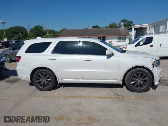 2017 Dodge Durango GT with VIN 1C4RDHDG9HC923668, listed as a IAAI auction lot 42048583 with 107,415 mi miles and . Bid and sale history available at DreamBid. Image 14.