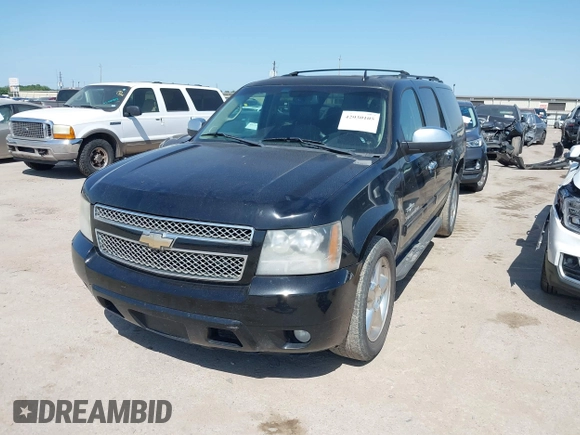 2011 Chevrolet Suburban LT with VIN 1GNSCJE09BR235355, listed as a IAAI auction lot 42030105 with 308,576 mi miles. Bid and sale history available at carsss.com. Image 17.