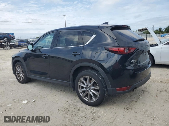 2020 Mazda CX-5 Grand Touring with VIN JM3KFBDM4L0738976, listed as a Copart auction lot 56683955 with 191,650 mi miles and Clean Title. Bid and sale history available at DreamBid. Image 2.