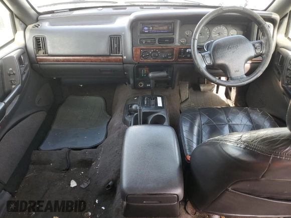 1996 Jeep Grand Cherokee Limited с VIN 1J4GZ78S2TY123592, выставлен на аукционе Copart как лот 84387624 с пробегом Не указан миль и Списание • Salvage title. История ставок и продаж доступна на DreamBid. Изображение 8.
