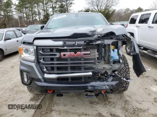 2022 GMC Canyon 4WD AT4 z VIN 1GTG6FENXN1274389, wystawiony jako Copart lot #85255404 z przebiegiem 42 843 mil mil oraz Szkoda całkowita • Salvage title. Historia ofert i sprzedaży dostępna na DreamBid. Obrazek 5.