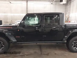 2021 Jeep Gladiator Rubicon with VIN 1C6JJTBGXML529108, listed as a IAAI auction lot 42139924 with 32,204 mi miles and . Bid and sale history available at DreamBid. Image 15.