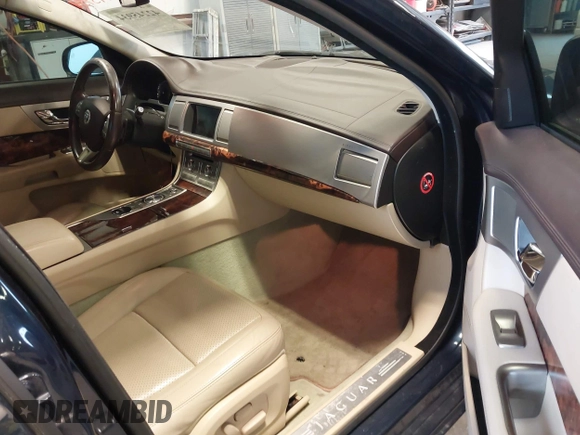 2010 Jaguar XF Premium Luxury with VIN SAJWA0GB0ALR75954, listed as a IAAI auction lot 42245934 with 130,300 mi miles and . Bid and sale history available at DreamBid. Image 5.