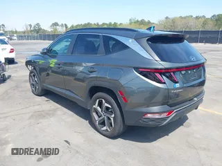 2022 Hyundai Tucson SEL z VIN 5NMJCCAE4NH096813, wystawiony jako IAAI lot #41899641 z przebiegiem 23 668 mil mil oraz . Historia ofert i sprzedaży dostępna na DreamBid. Obrazek 3.