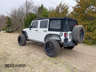 2016 Jeep Wrangler Unlimited Sport with VIN 1C4HJWDG7GL114807, listed as a Copart auction lot 54988515 with 118,651 mi miles and Clean Title. Bid and sale history available at DreamBid. Image 3.