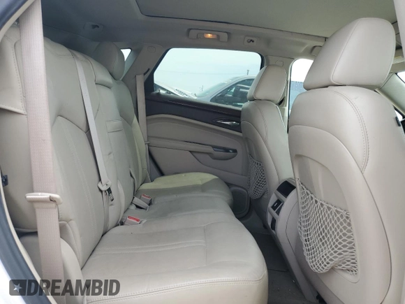2012 Cadillac SRX Performance Collection z VIN 3GYFNBE32CS588355, wystawiony jako Copart lot #56704075 z przebiegiem 195 162 mil mil oraz Szkoda całkowita • Salvage title. Historia ofert i sprzedaży dostępna na DreamBid. Obrazek 11.
