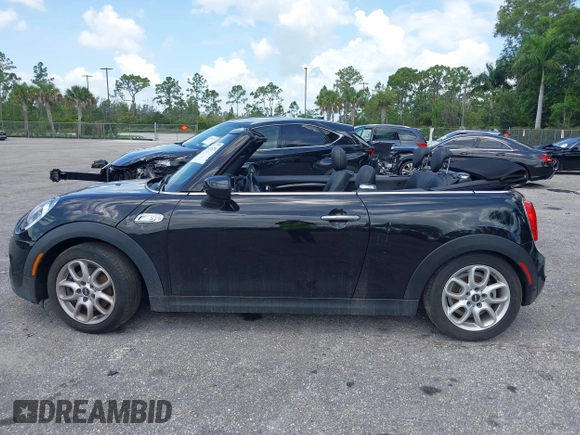 2021 MINI Convertible Cooper S z VIN WMWWJ5C0XM3M08622, wystawiony jako IAAI lot #42507679 z przebiegiem 36 932 mil mil oraz . Historia ofert i sprzedaży dostępna na DreamBid. Obrazek 14.