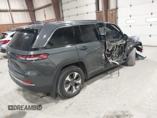 2023 Jeep Grand Cherokee with VIN 1C4RJYB6XPC664772, listed as a IAAI auction lot 41913782 with 41,872 mi miles and . Bid and sale history available at DreamBid. Image 4.
