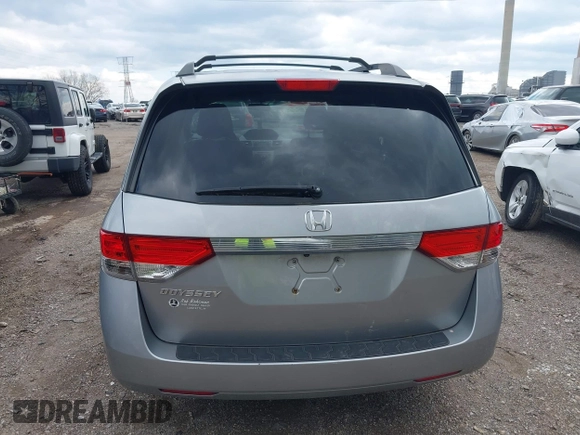 2016 Honda Odyssey LX with VIN 5FNRL5H23GB028338, listed as a IAAI auction lot 41980064 with 186,403 mi miles and . Bid and sale history available at DreamBid. Image 16.