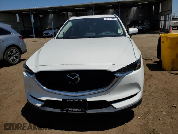 2018 Mazda CX-5 Grand Touring z VIN JM3KFBDM1J0473754, wystawiony jako Copart lot #60362245 z przebiegiem 72 792 mil mil oraz Szkoda całkowita • Salvage title. Historia ofert i sprzedaży dostępna na DreamBid. Obrazek 5.