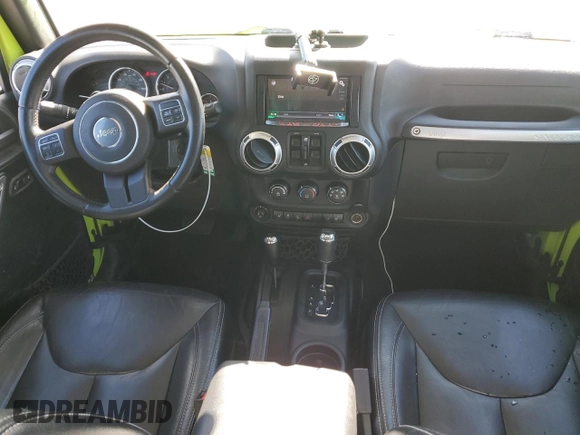 2016 Jeep Wrangler Unlimited Rubicon with VIN 1C4HJWFG2GL296235, listed as a Copart auction lot 50576595 with 60,076 mi miles and Salvage Title. Bid and sale history available at carsss.com. Image 8.