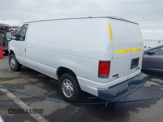 2014 Ford Econoline Cargo Commercial with VIN 1FTNE1EWXEDA18404, listed as a IAAI auction lot 42173934 with 188,301 mi miles and . Bid and sale history available at DreamBid. Image 3.