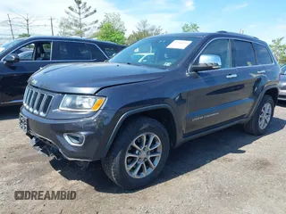 2014 Jeep Grand Cherokee Limited z VIN 1C4RJFBG3EC570064, wystawiony jako IAAI lot #42246935 z przebiegiem 120 766 mil mil oraz . Historia ofert i sprzedaży dostępna na DreamBid. Obrazek 2.